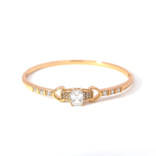 Elegant Gold Bangle with Emerald-Cut Diamond